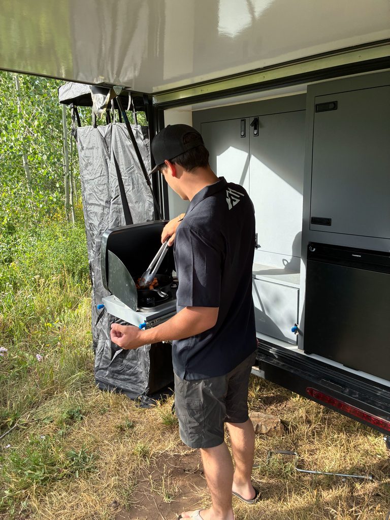A full kitchen in a hunting camper is not a luxury, not if you are going out for more than a weekend.