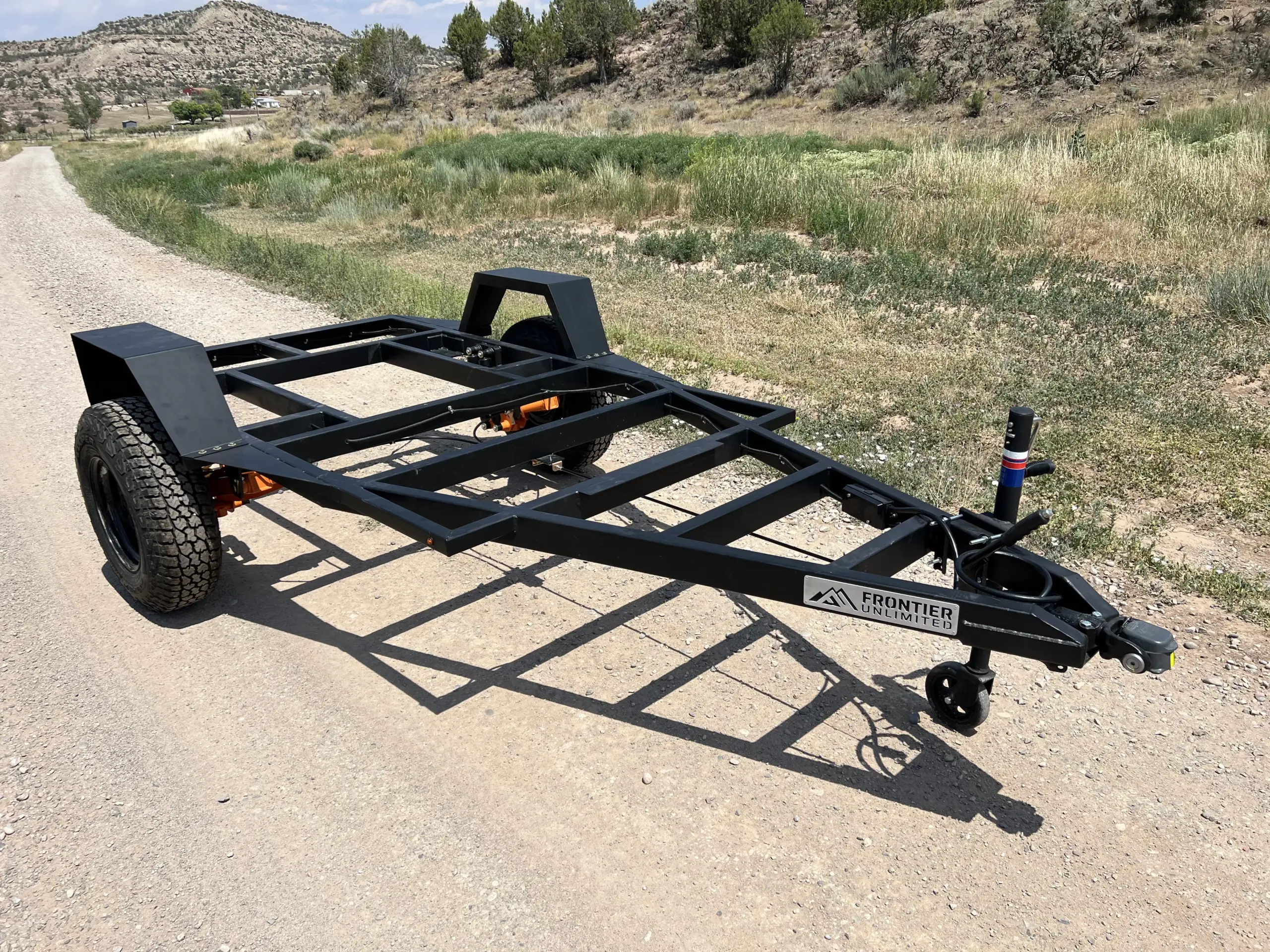 CNC-cut powder-coated steel chassis on the ROCH off-road hunting trailer